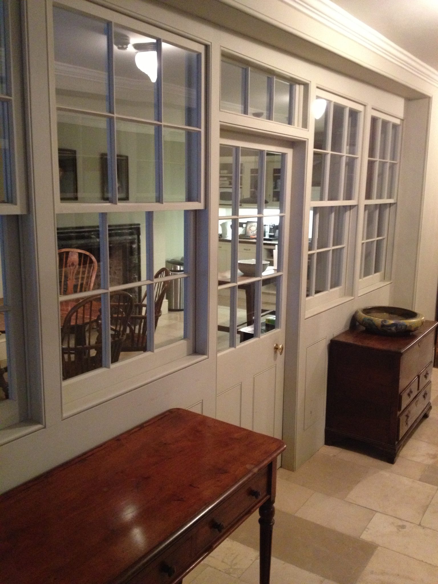 Gorgeous glazing looking into the servants working rooms below stairs. 