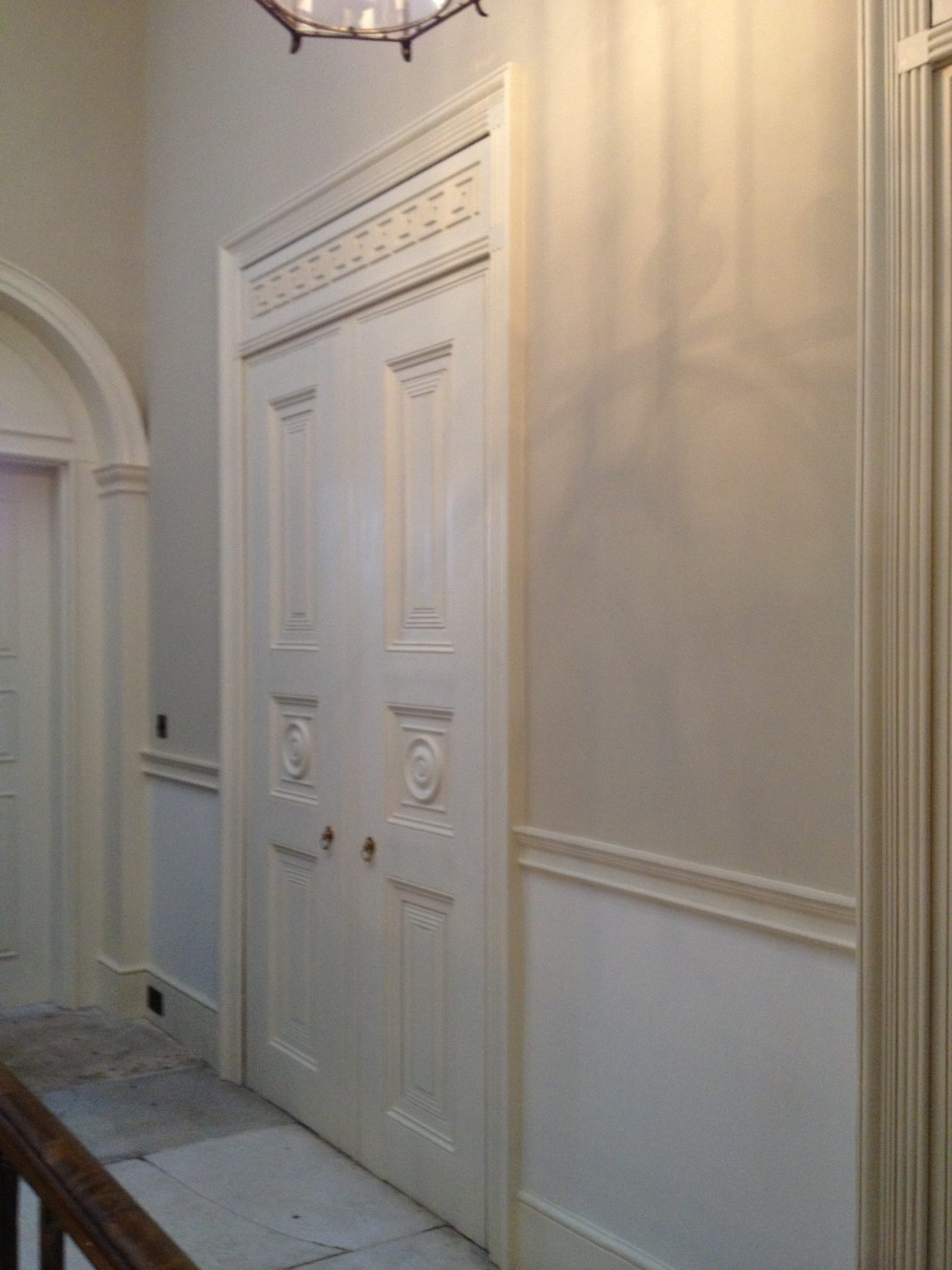 Gorgeous restoration doors with elegant Greek motif