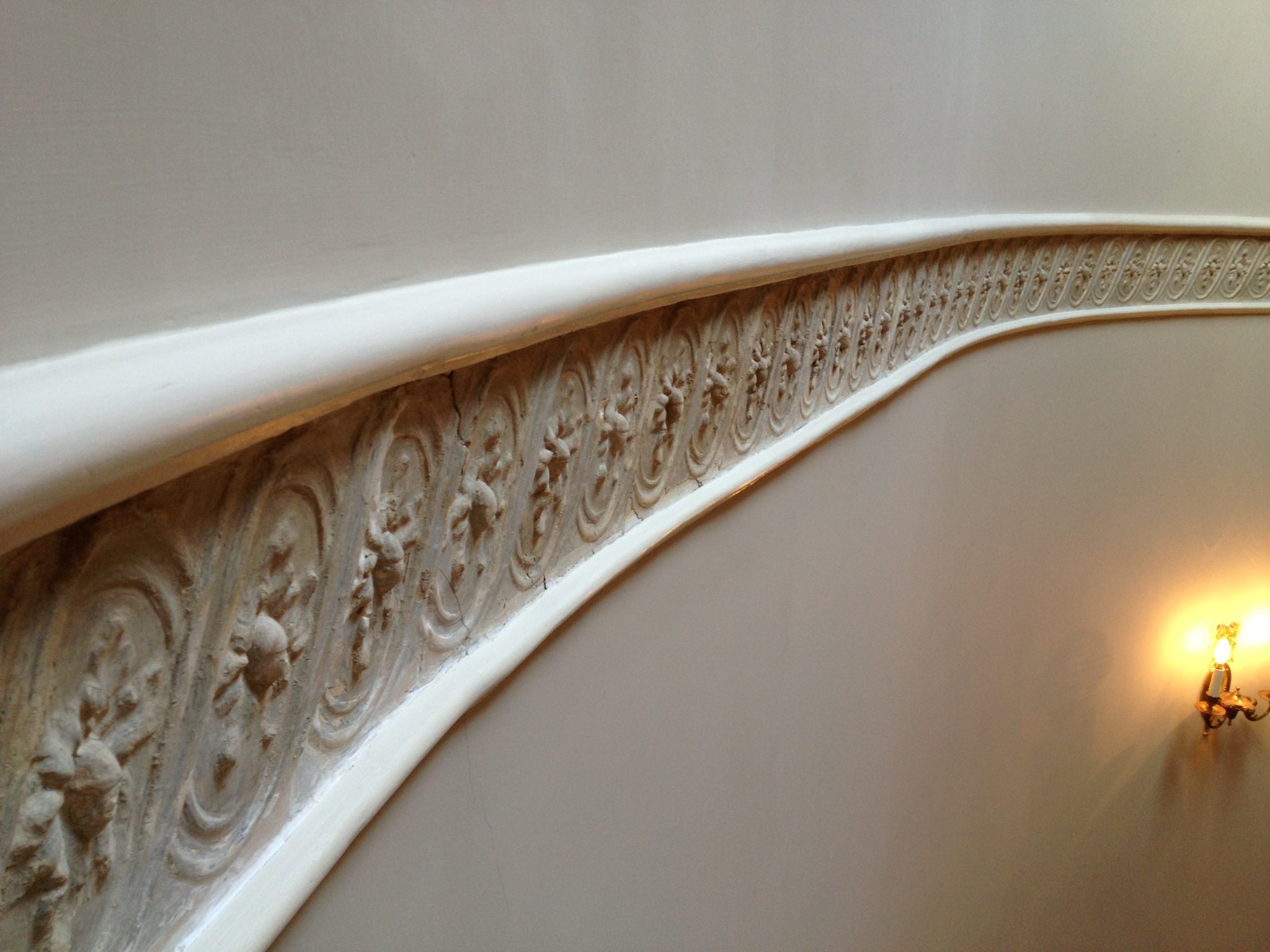 Fabulous frieze running at the top level of the stairs