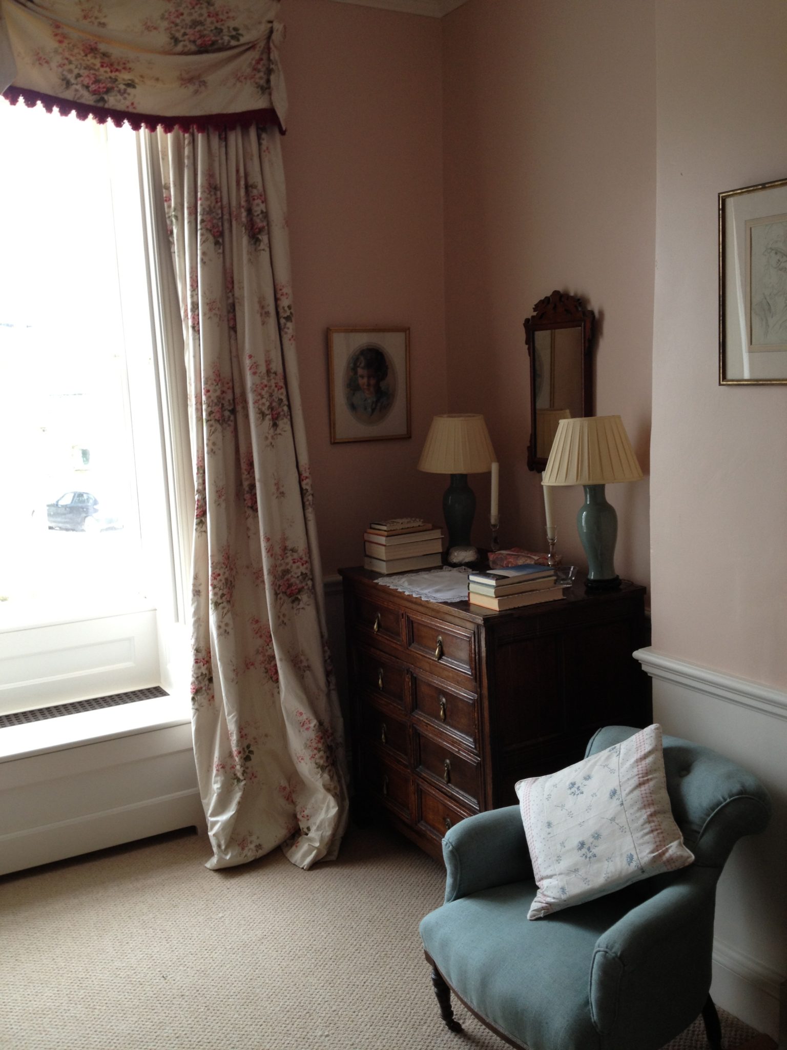 Farrow & Ball Pink ground creates a classic but feminine feel with the mahogany furniture preventing it from feeling sickly