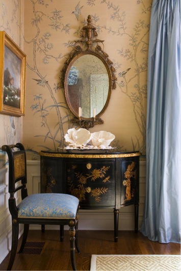 Chinoiserie wallpaper complemented by ebonised Chinoise furniture