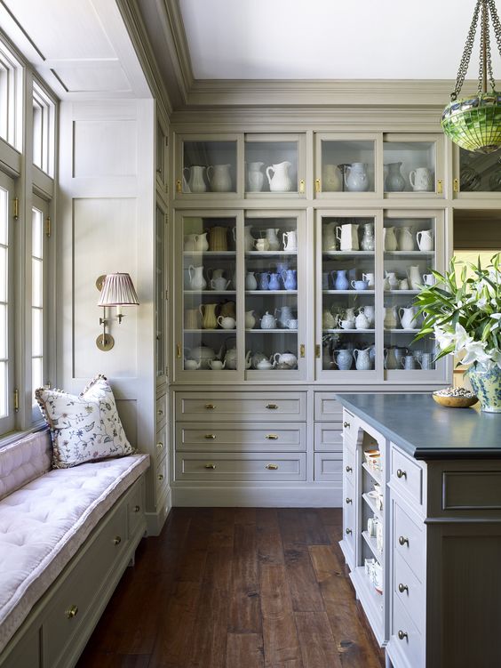 Banquette built into the window of this Georgian kitchen