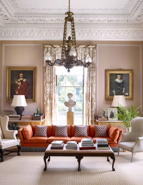 A soft peachy pink is complemented with a single accent of contemporary orange on Georgian upholstery