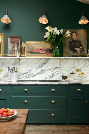 A dramatic marble splash back Dramatic marble splashback and countertop is striking against the contrast