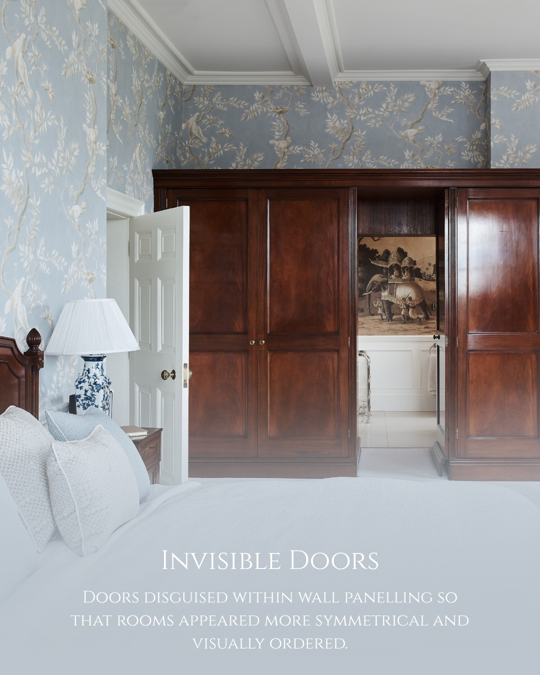 Concealed door within painted wall panelling